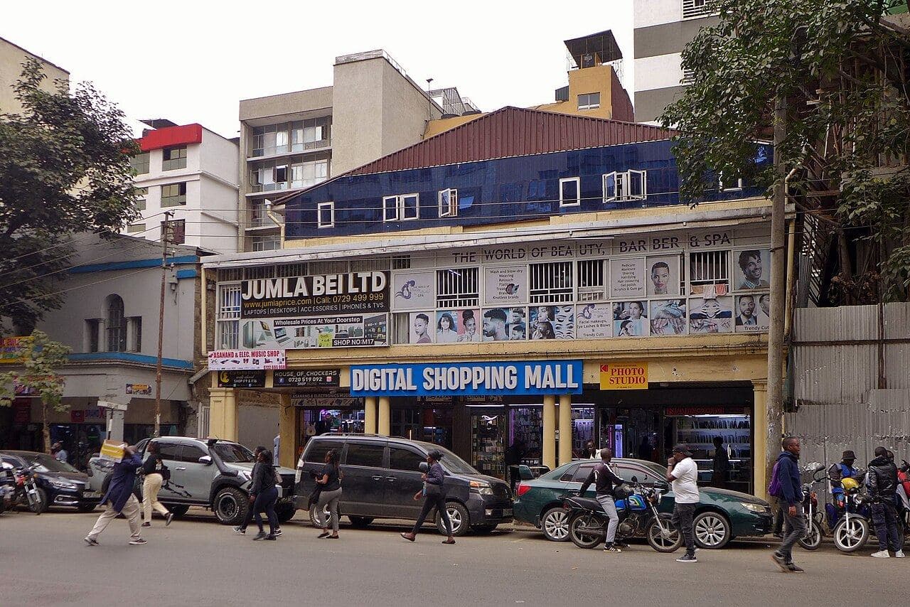 A shopping mall entrance on a busy Nairobi street